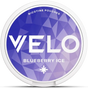 A round white container of Velo Blueberry Ice nicotine pouches, featuring a blue and purple geometric pattern label with white text.